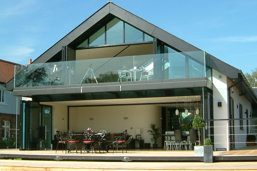 A large modern house with glass structures